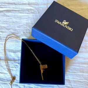 Swarovski James Bond pistol pendant and necklace, 14k gold